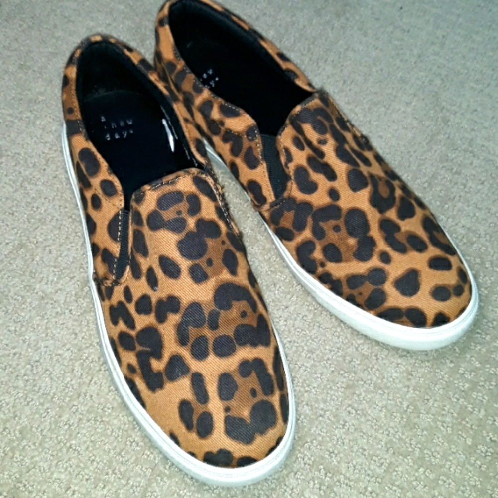A New Day womens brown animal print fabric slip ons. Size 10